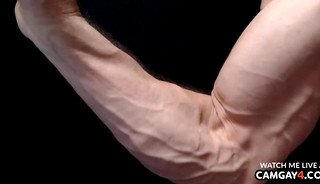 Muscular man showing his pectorals