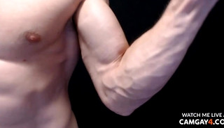 Muscular man showing his pectorals