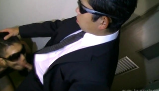 Asian suit sucking
