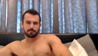 Guy plays with his cum after stroking his big dick