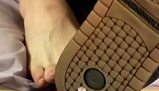 Stroking their dicks while intertwining feet for cute twinks