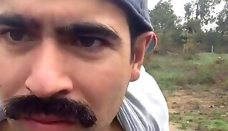 Latino23bom jerks and pees outside