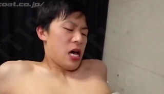 A cute man is used as a sex toy by two men
