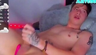 pretty latino boy with tattoos tugs her big cock