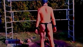 naked slave exposed outdoor at campfire dirty body writing fucktoy outdoor fitness BDSM