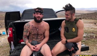 Horny studs enjoy hot bareback fun in an open desert