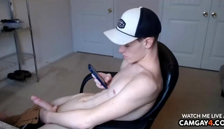 Young handsome guy jerking off in webcam