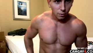 Handsome muscular man stroking his cock in webcam