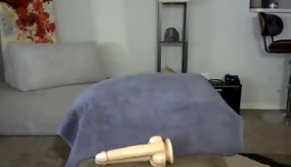 Hunk plays with a huge dildo