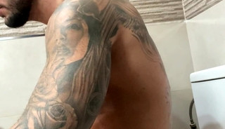 Hot dude jerking in bathroom
