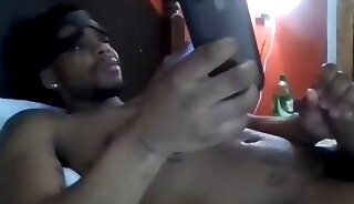 Horny black man masturbating