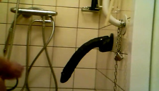 slave pisses on dildo and sucks dildo completely