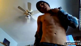Young boy masturbating and caressing himself in webcam