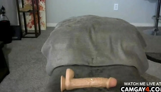 Man penetrates asshole with dildo and enjoys it