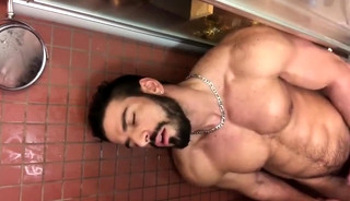 Muscle hunk solo showering