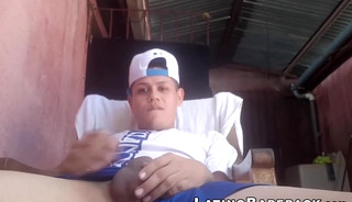 Outdoor wanking with sexy young Latino wearing baseball cap