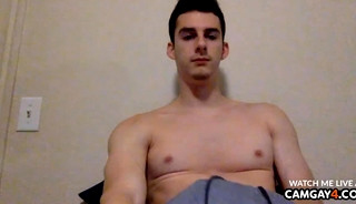 Muscular man showing his nipples and dick in webcam