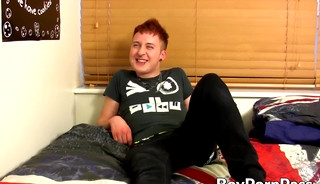 Redhead twink Josh Dixon fingers butt while rubbing cock