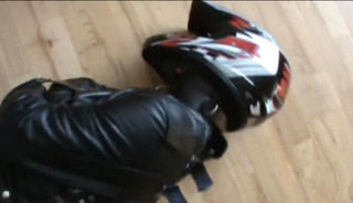 Slave in leahter straitjacket