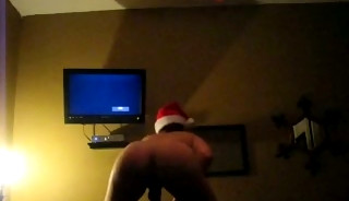 Amateur Gay In Santa Hat Dancing On A Bed