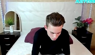 pretty twink boy with tattoos strokes his cock on webcam