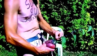 naked slave exposed outdoor body writing sounding stinging nettle swollen dick