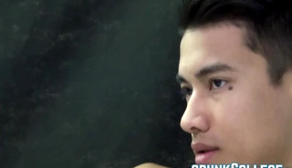 Feminine Asian jock Ken Ott toying his rock hard dick