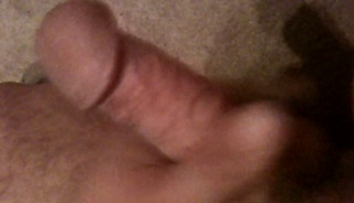 Playing with massive cock