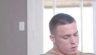 Tattooed sturdy newbie masturbates on a couch until cumshot