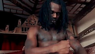 Tattooed black newcomer Fame strokes his monster cock