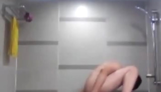 Little Oriental Twink Masterbates in Shower