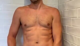 Rubbing my own cum on my face.