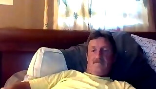 Mature lying on his bed