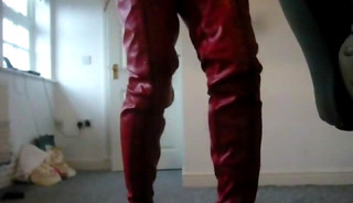 Standing in red crotch high ballet Boots