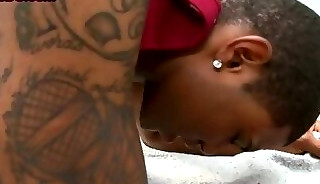 Tattooed black gay drilled in anal hole in doggystyle