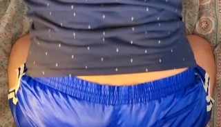 Riding dildo with blue adidas nylon shorts