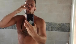 I jerk off looking in the bathroom mirror