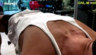 Hot Asian guy training hard his pecs for nipple play!