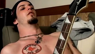 Straight guy playing guitar and jacking off his hairy cock