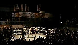 old boxer dominating young boxer in ring