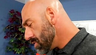 Fisted stud with glasses dominated by hunk in meeting room