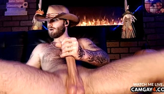 Cowboy wanking with his big cock with hairy body