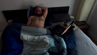 Watching porn in bed