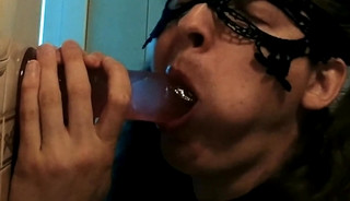 Crossdressers's practice with a big dildo