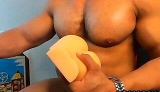 Muscular friend with glasses masturbates with his toy