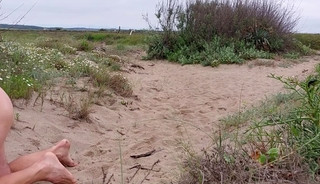 naked pathetic slave in penis cage and dogtail at the gay beach