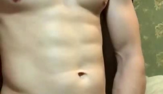 Handsome Muscular Aussie jerks off his uncut cock and cum in the palm of his hand