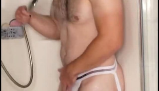 Austin Martin in the shower