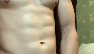 Handsome Muscular Aussie jerks off his uncut cock and cum in the palm of his hand