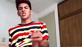 Amateur slim Latino strips undies and masturbates indoors